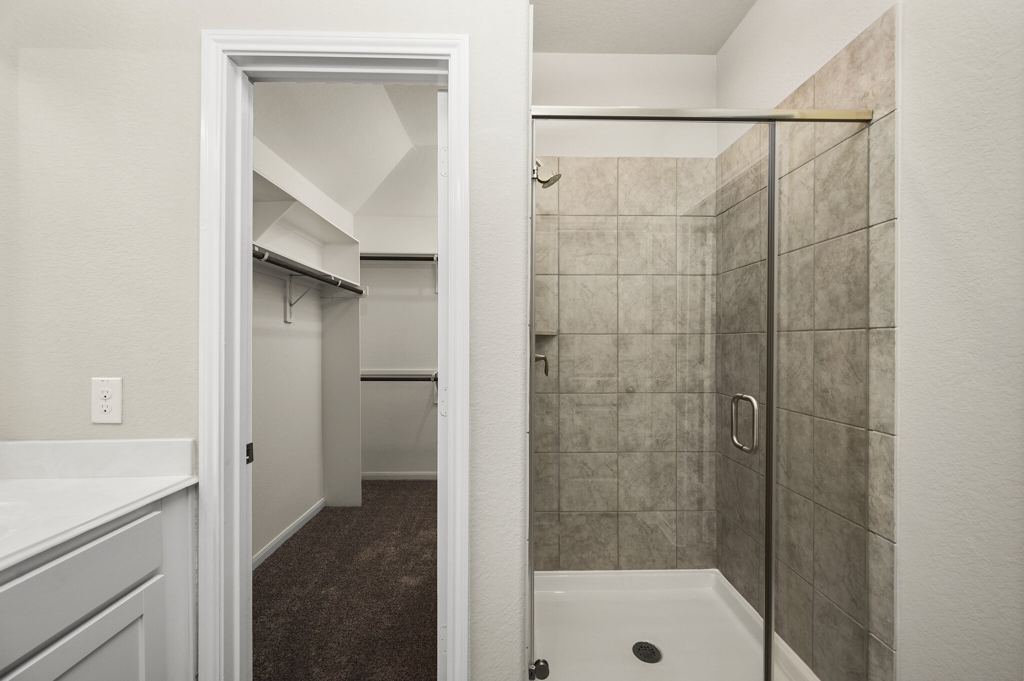 4507 Frontier Trail Baytown, TX 77521 - Photo 14 of 24 a bathroom with a shower and a sink