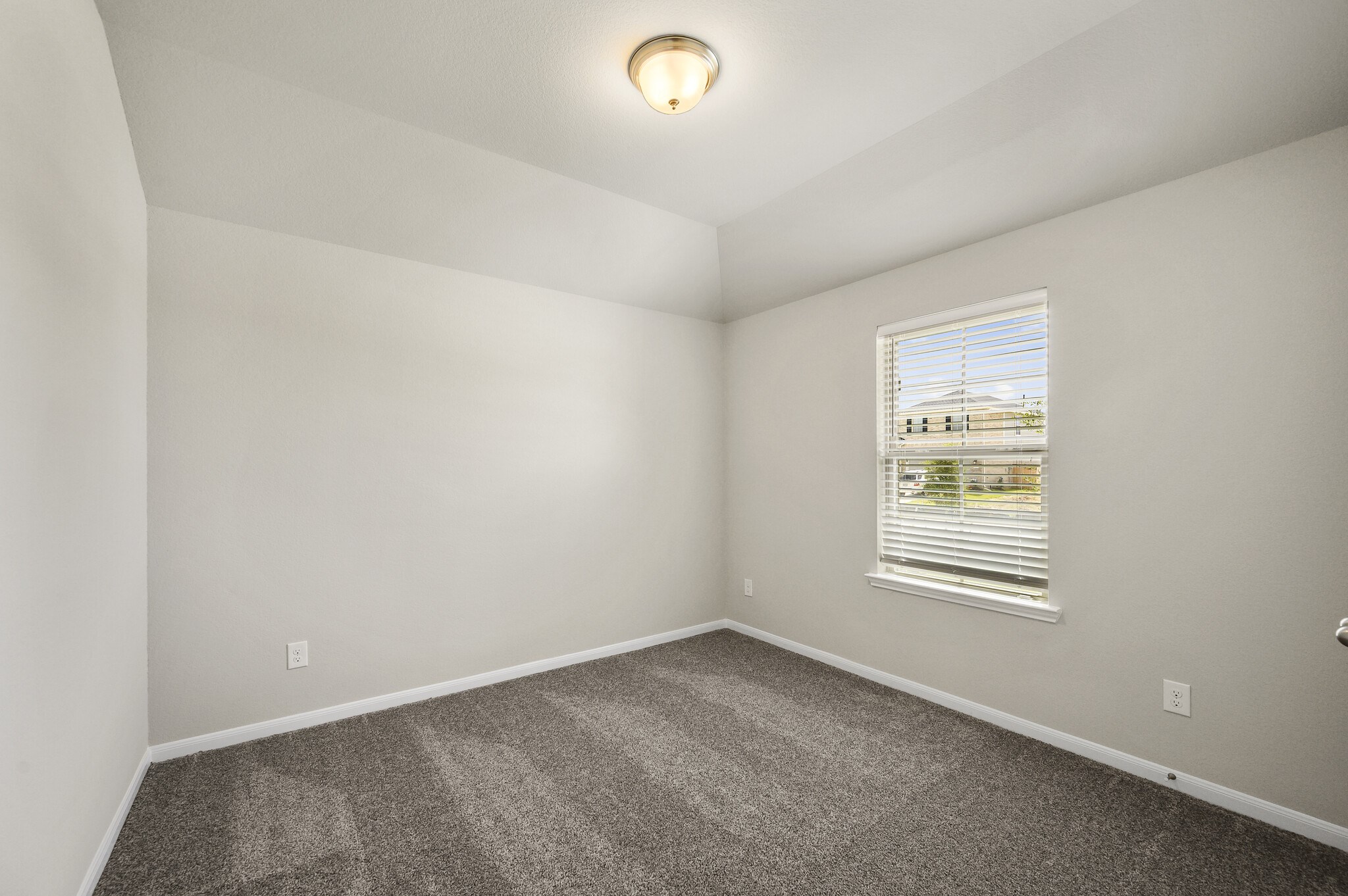 4507 Frontier Trail Baytown, TX 77521 - Photo 16 of 24 an empty room with a empty space and a window