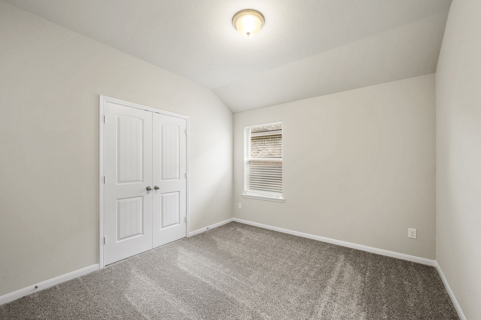 4507 Frontier Trail Baytown, TX 77521 - Photo 17 of 24 a view of empty room with windows