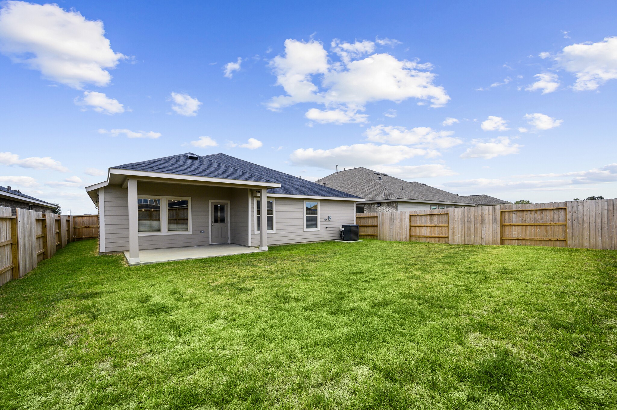 4507 Frontier Trail Baytown, TX 77521 - Photo 22 of 24 a front view of a house with garden