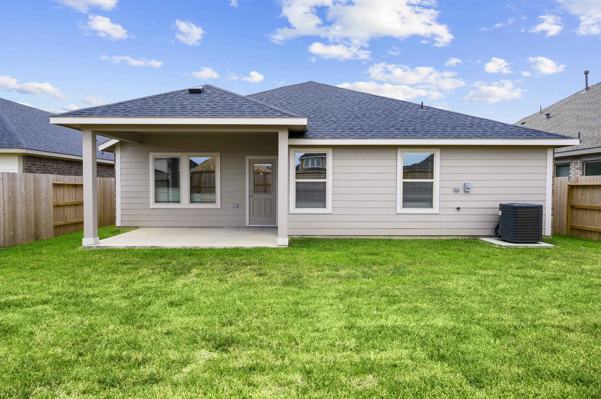 4507 Frontier Trail Baytown, TX 77521 - Photo 23 of 24 a front view of a house with garden