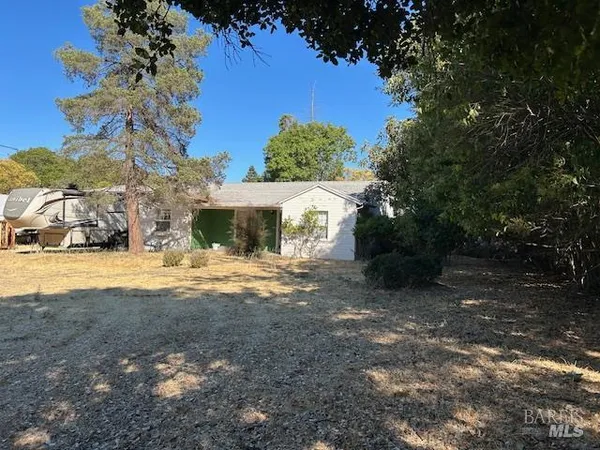 a view of house with outdoor space