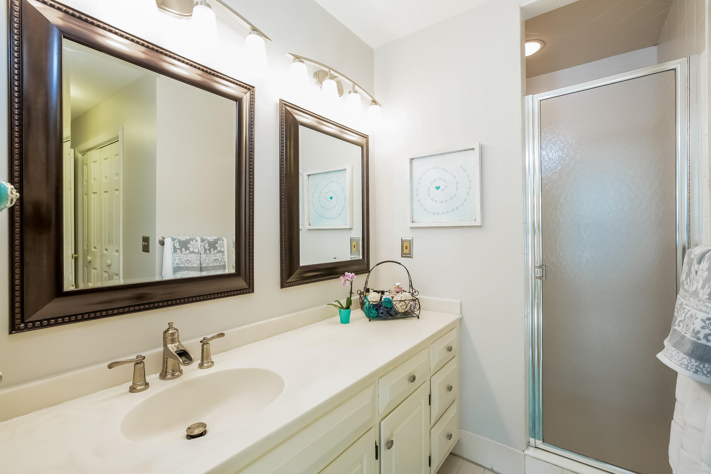 259 Marvin Ridge Road New Canaan, CT 06840 - Photo 15 of 38 a bathroom with a double vanity sink mirror and