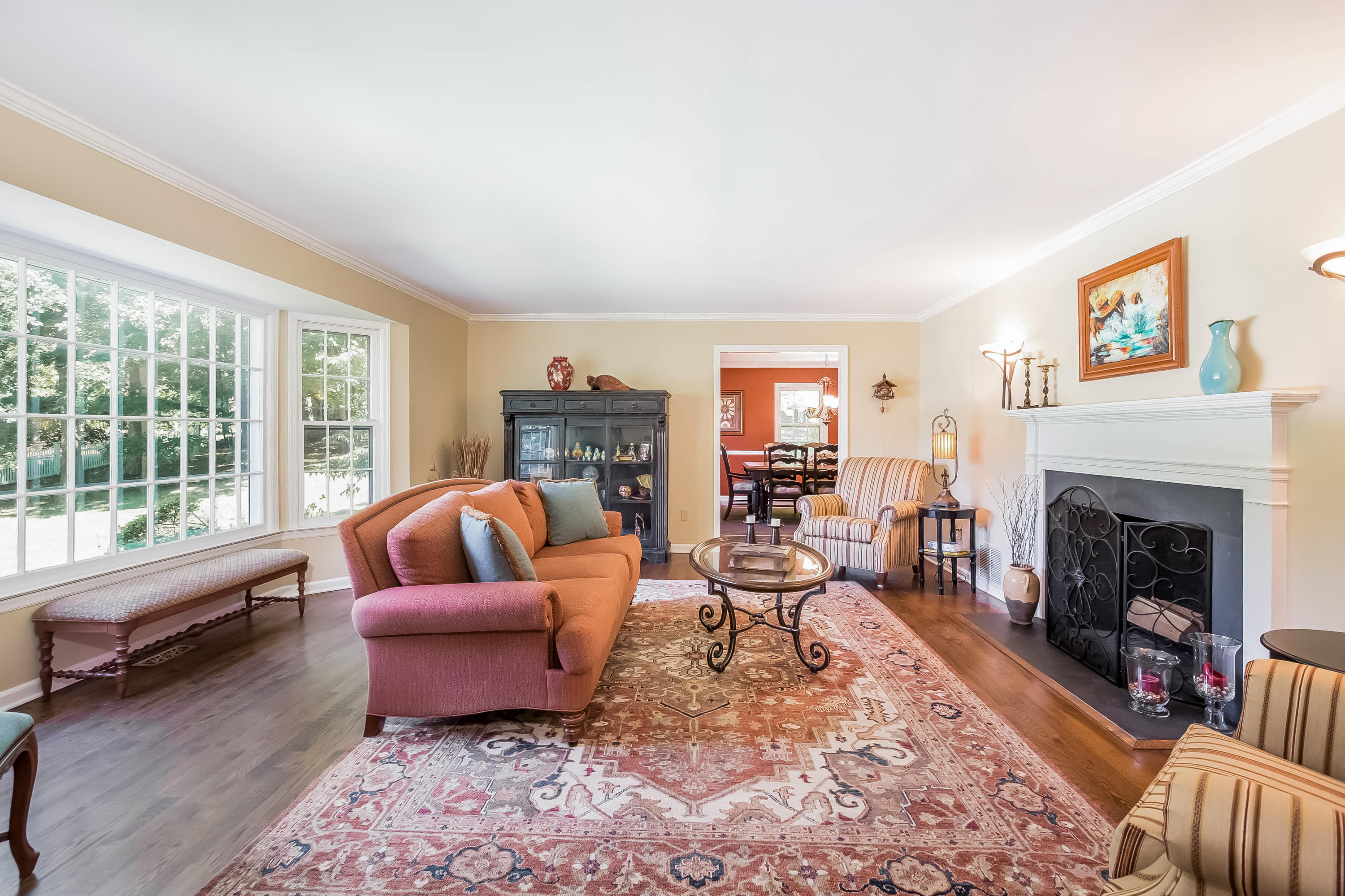 259 Marvin Ridge Road New Canaan, CT 06840 - Photo 3 of 38 a living room with furniture and a fireplace