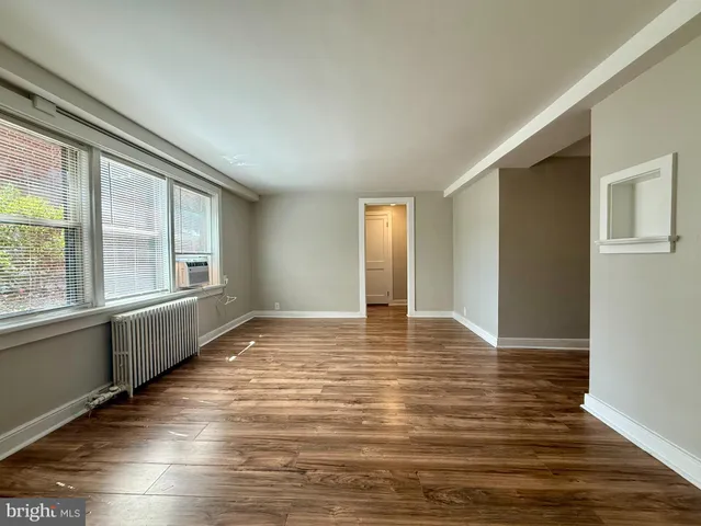 a view of an empty room with window