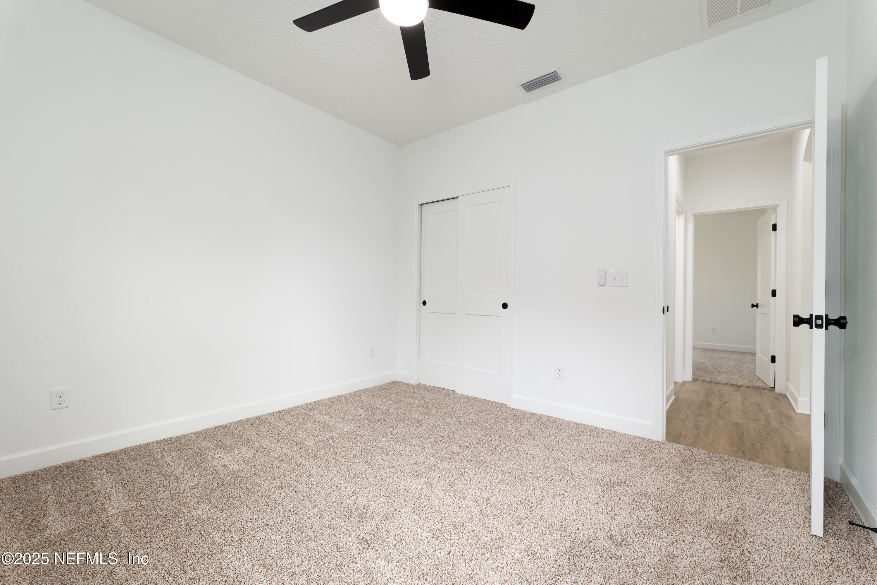 2482 Oleander Avenue Middleburg, FL 32068 - Photo 20 of 34 an empty room with fan