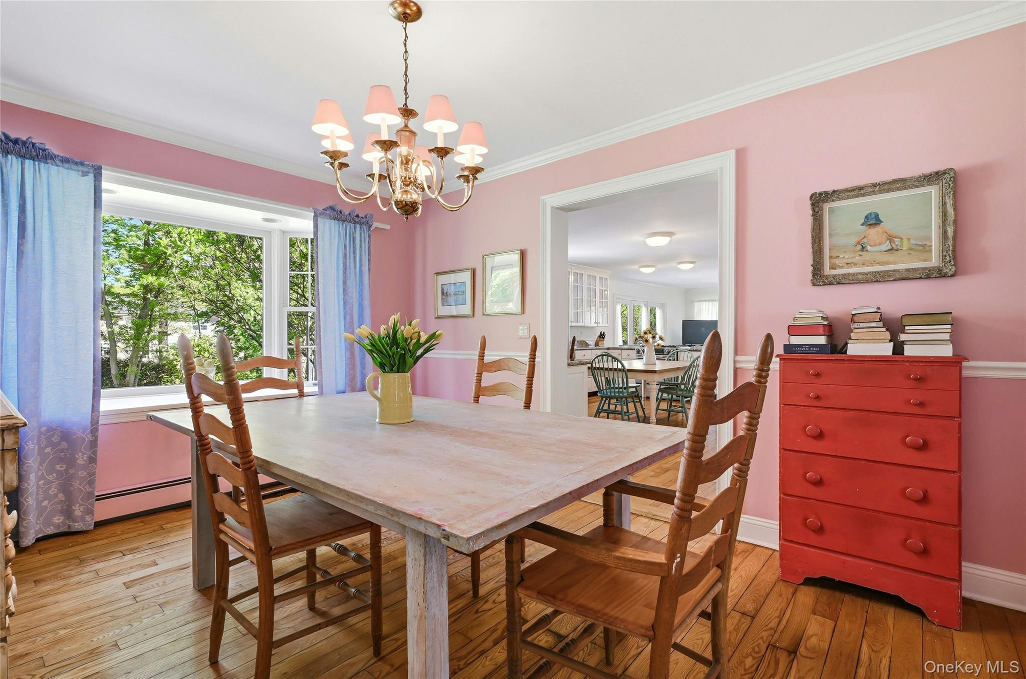 9 Townsend Road Glen Cove, NY 11542 - Photo 14 of 48 a view of a dining room with furniture and chandelier