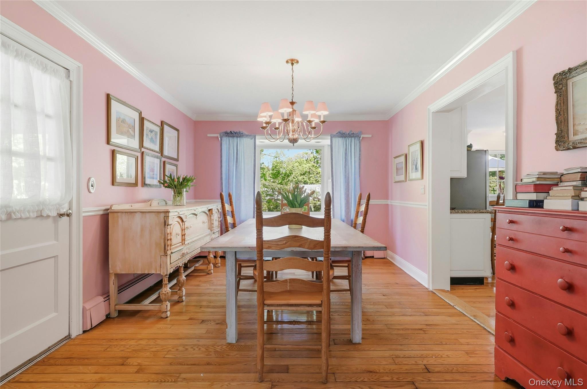 9 Townsend Road Glen Cove, NY 11542 - Photo 16 of 48 a view of a dining room with furniture window and wooden floor