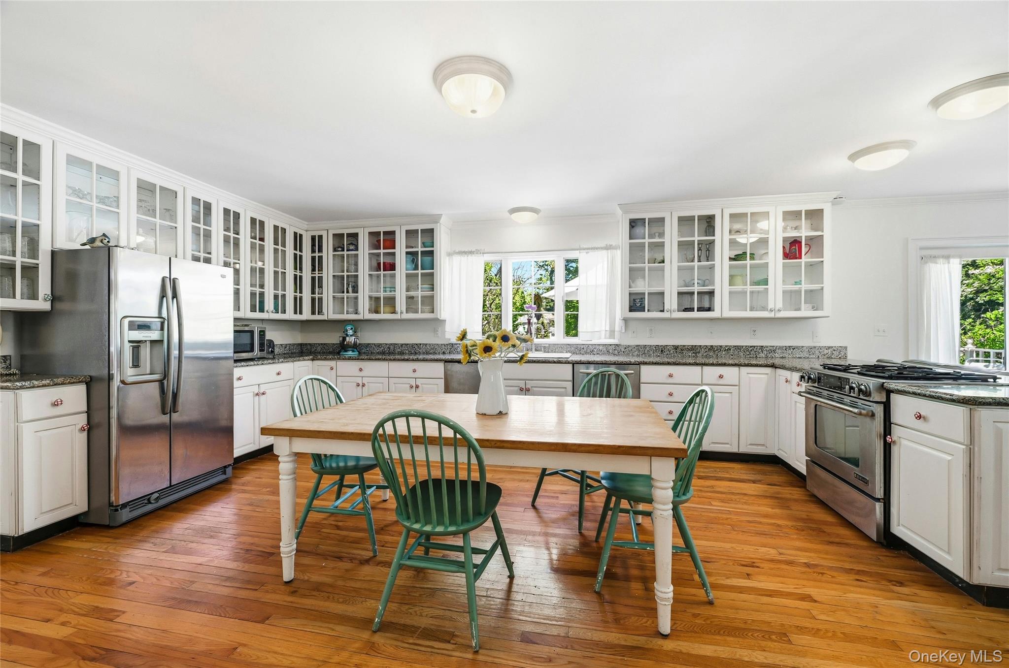 9 Townsend Road Glen Cove, NY 11542 - Photo 21 of 48 a view of a dining room with furniture and wooden floor
