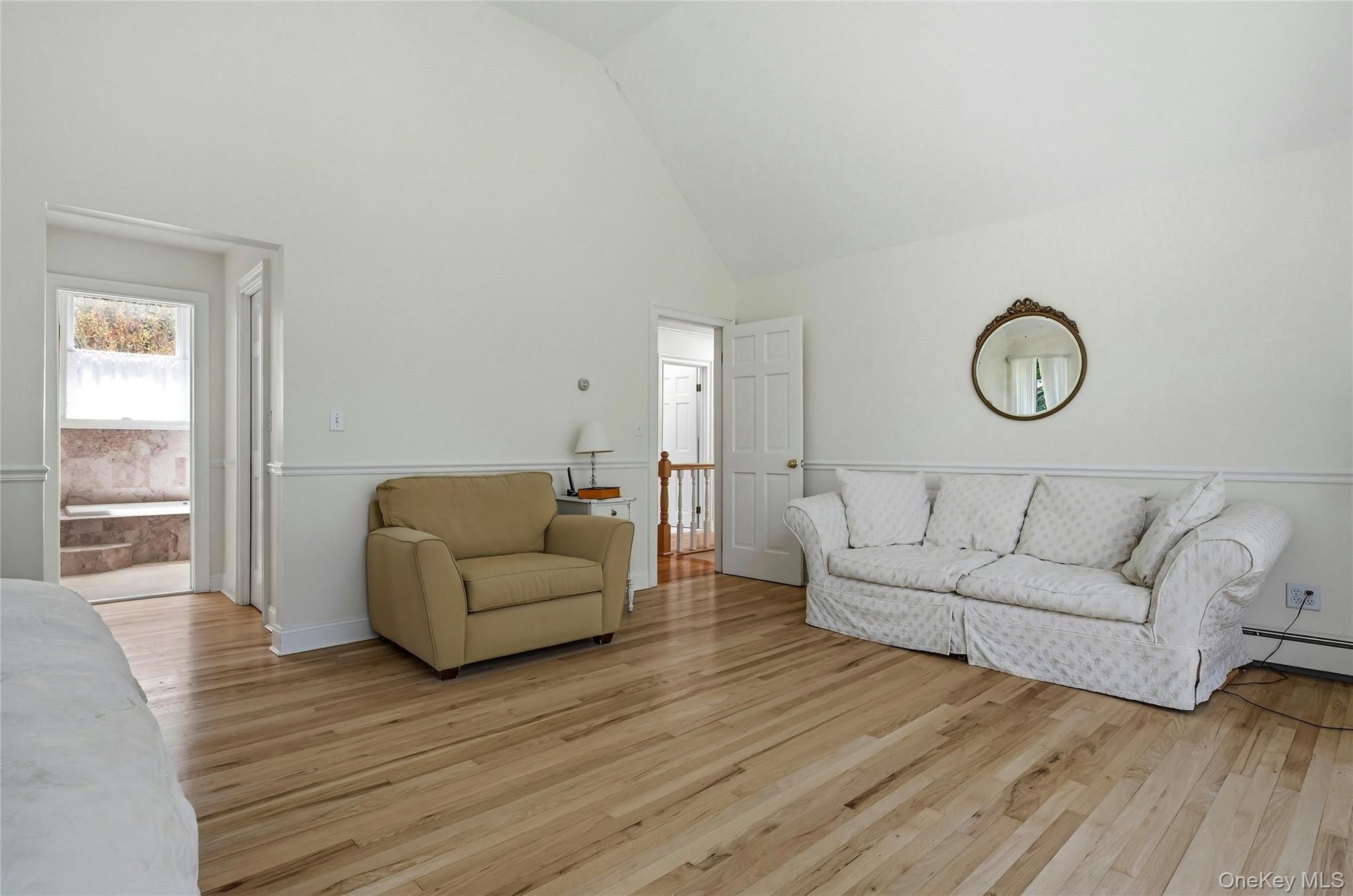 9 Townsend Road Glen Cove, NY 11542 - Photo 28 of 48 a living room with furniture and a large window
