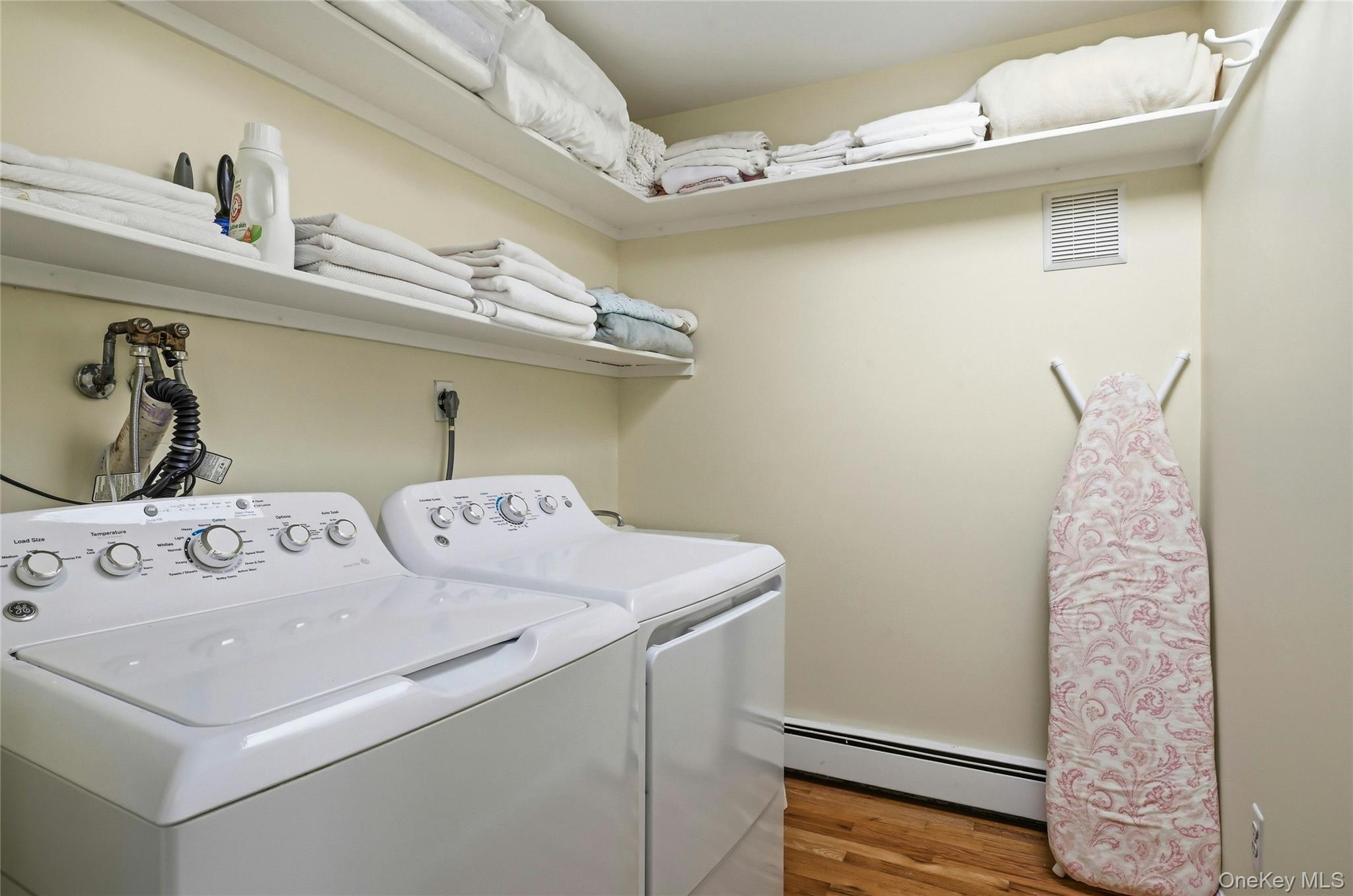 9 Townsend Road Glen Cove, NY 11542 - Photo 32 of 48 a utility room with dryer and washer