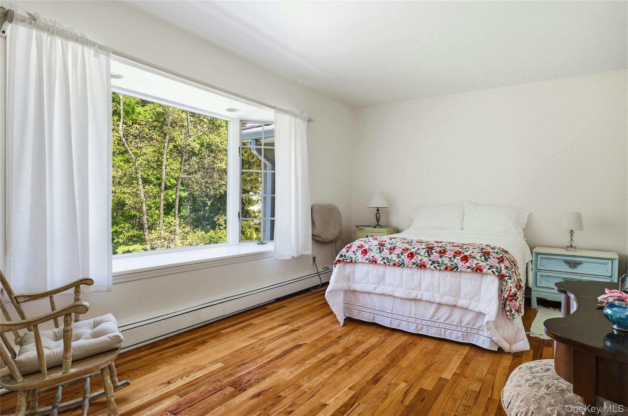 9 Townsend Road Glen Cove, NY 11542 - Photo 37 of 48 a bedroom with a bed and window