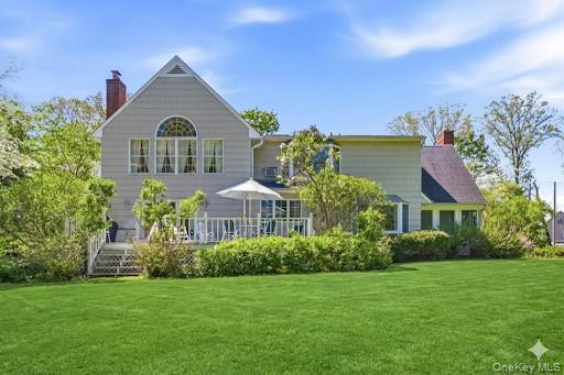 9 Townsend Road Glen Cove, NY 11542 - Photo 43 of 48 a front view of a house with a yard
