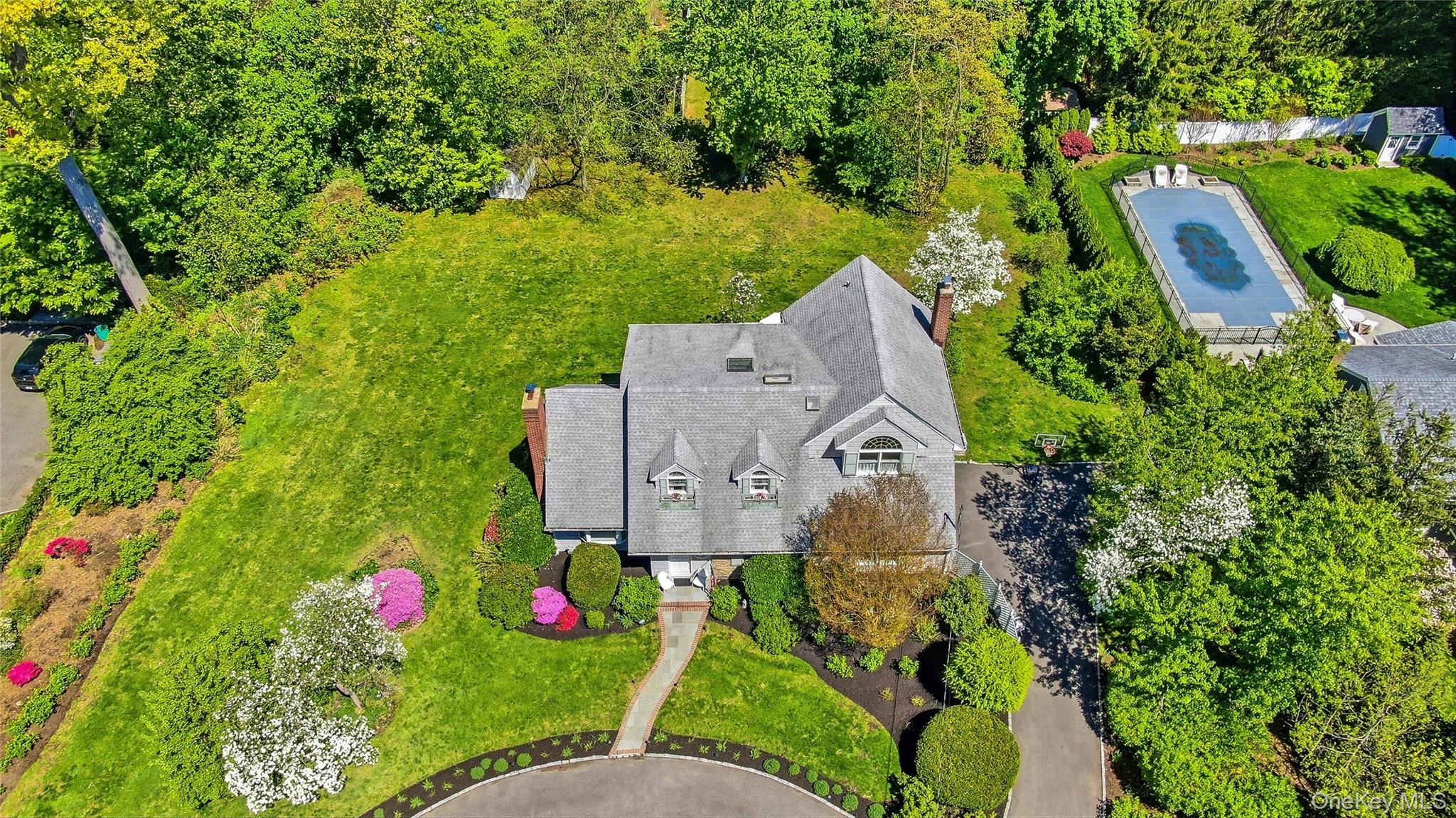 9 Townsend Road Glen Cove, NY 11542 - Photo 47 of 48 an aerial view of residential house with outdoor space and swimming pool