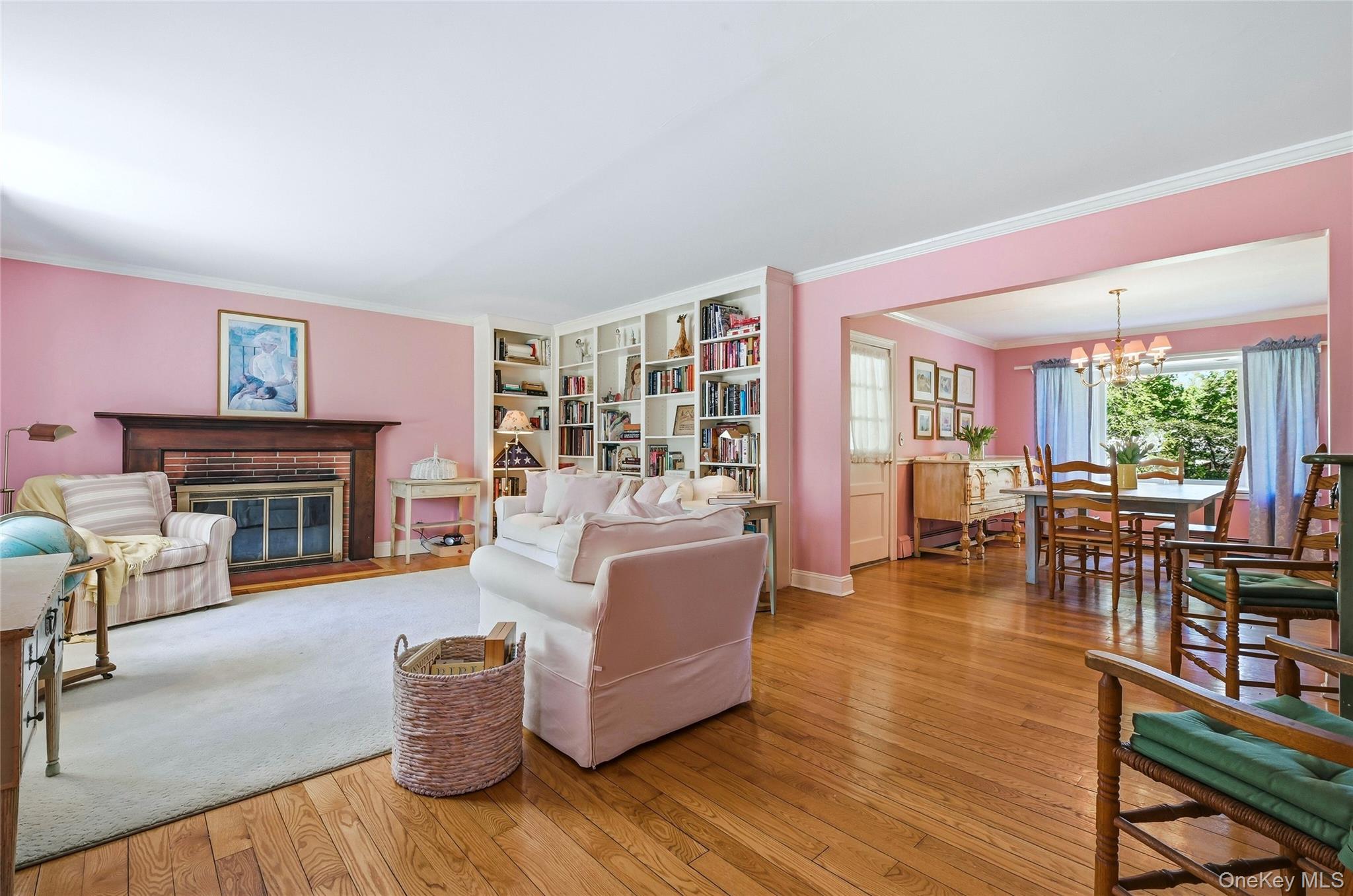 9 Townsend Road Glen Cove, NY 11542 - Photo 7 of 48 a living room with fireplace furniture and a wooden floor
