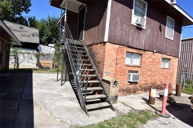 an outdoor space with seating space