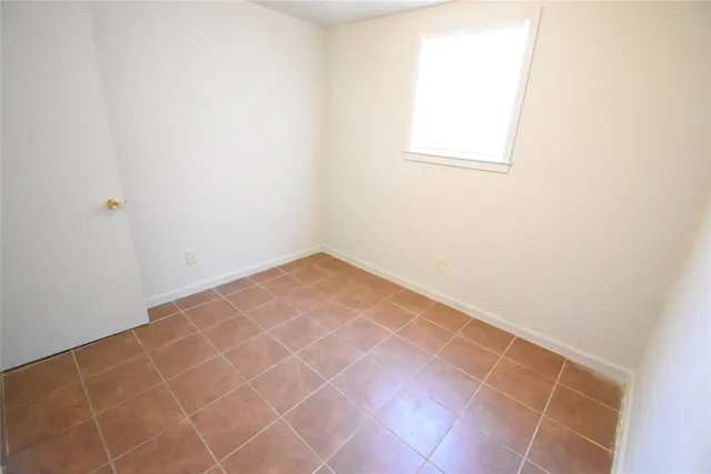 an empty room with closet