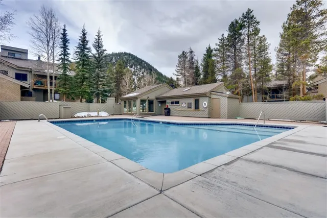 a view of a house with swimming pool