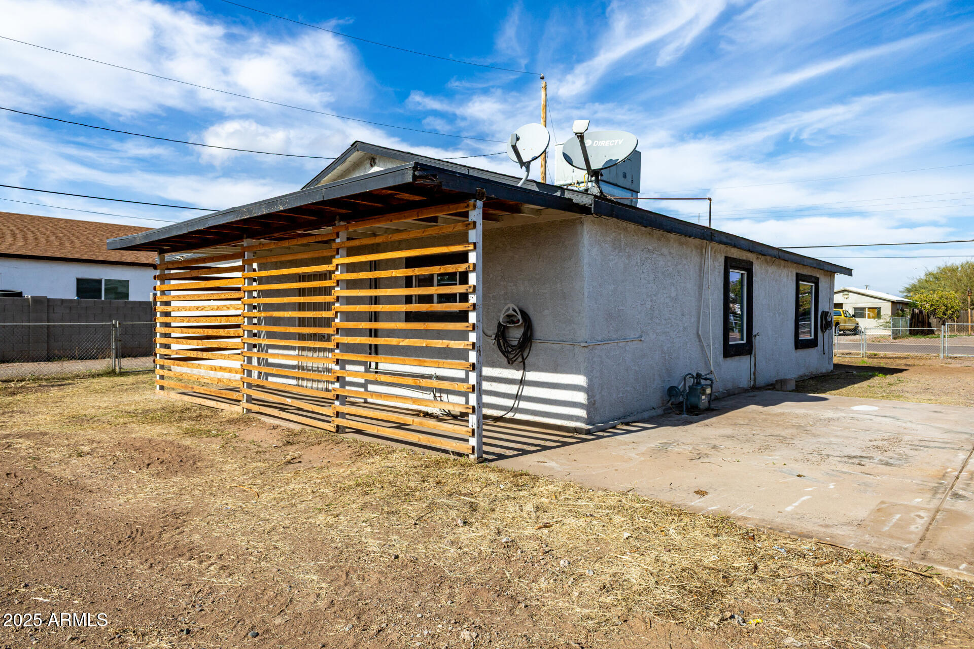 2811 West Pima Street Phoenix, AZ 85009 - Photo 20 of 24 a front view of a house with a garage