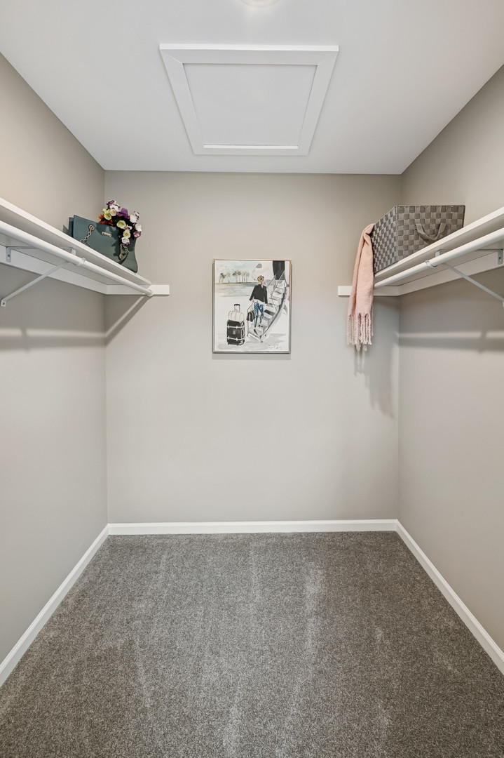 27 Windward Circle Willowbrook, IL 60527 - Photo 16 of 35 a view of a room with racks on the wall