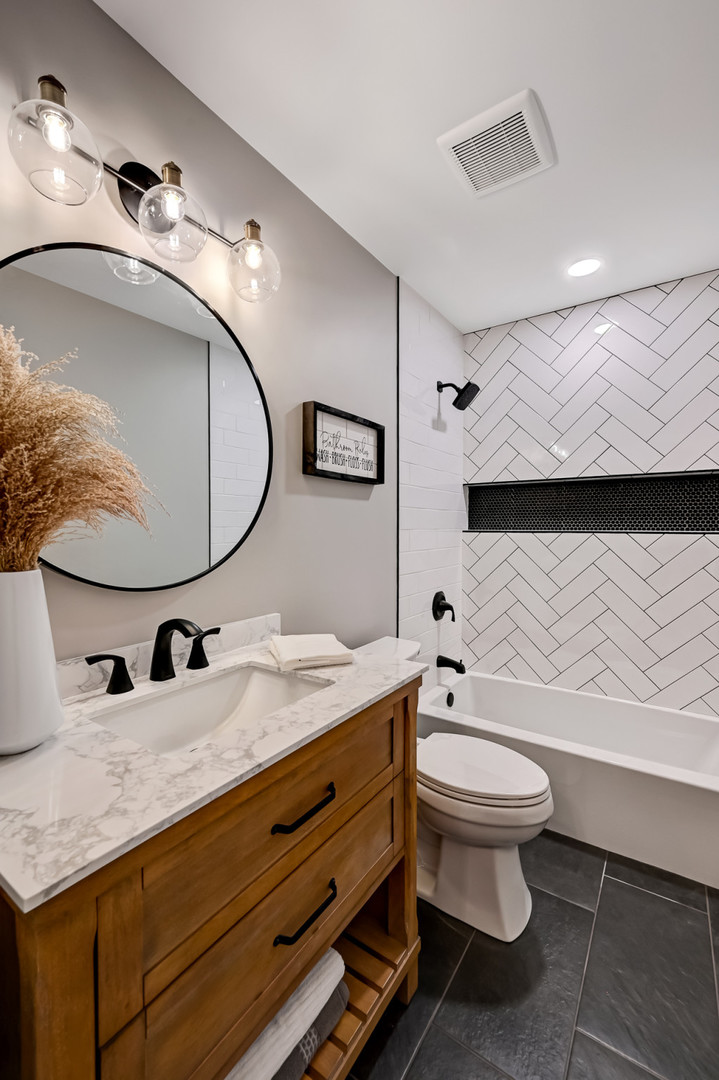 27 Windward Circle Willowbrook, IL 60527 - Photo 19 of 35 a bathroom with a granite countertop toilet sink and mirror