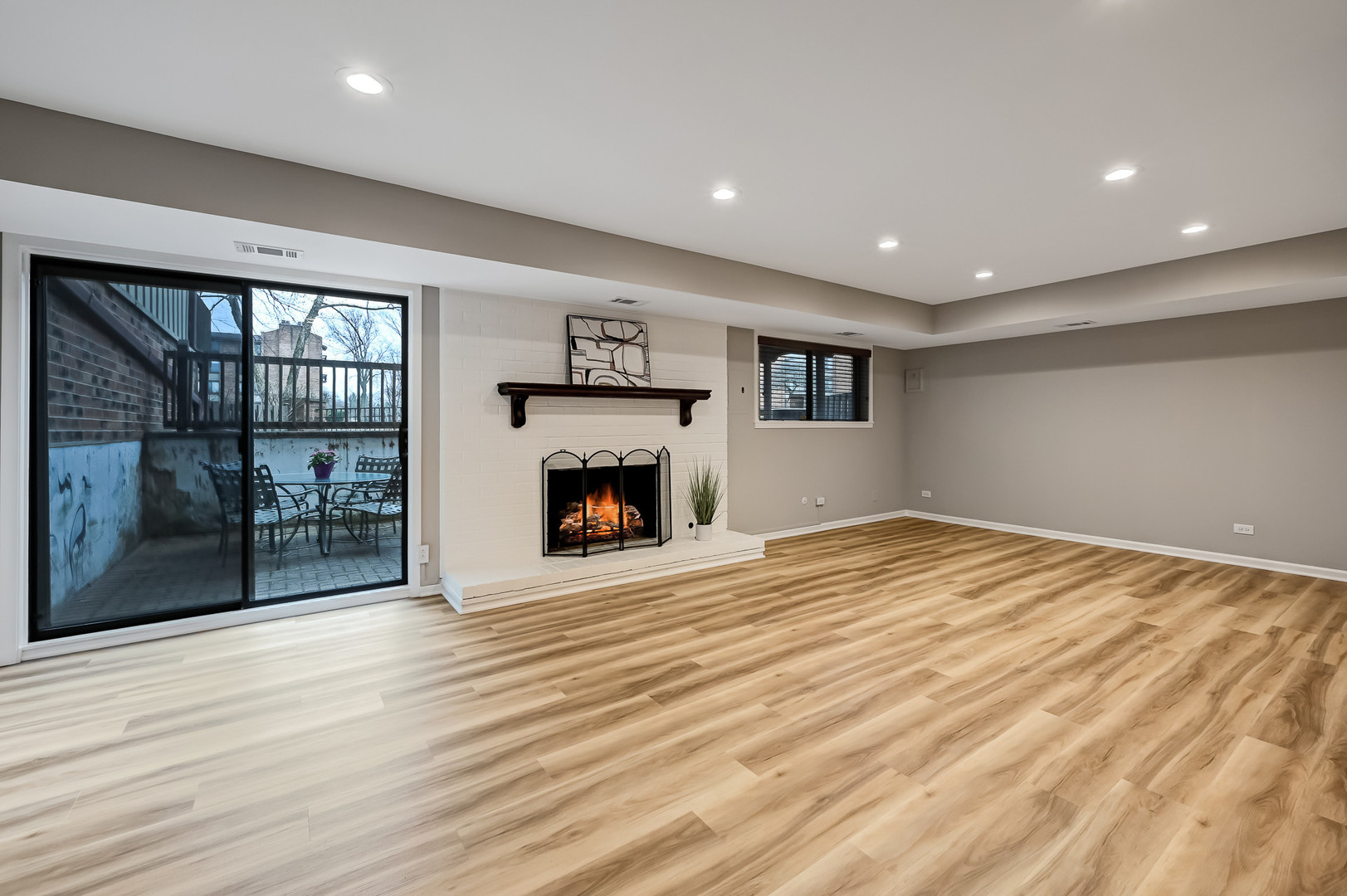 27 Windward Circle Willowbrook, IL 60527 - Photo 20 of 35 a view of empty room with wooden floor and fireplace