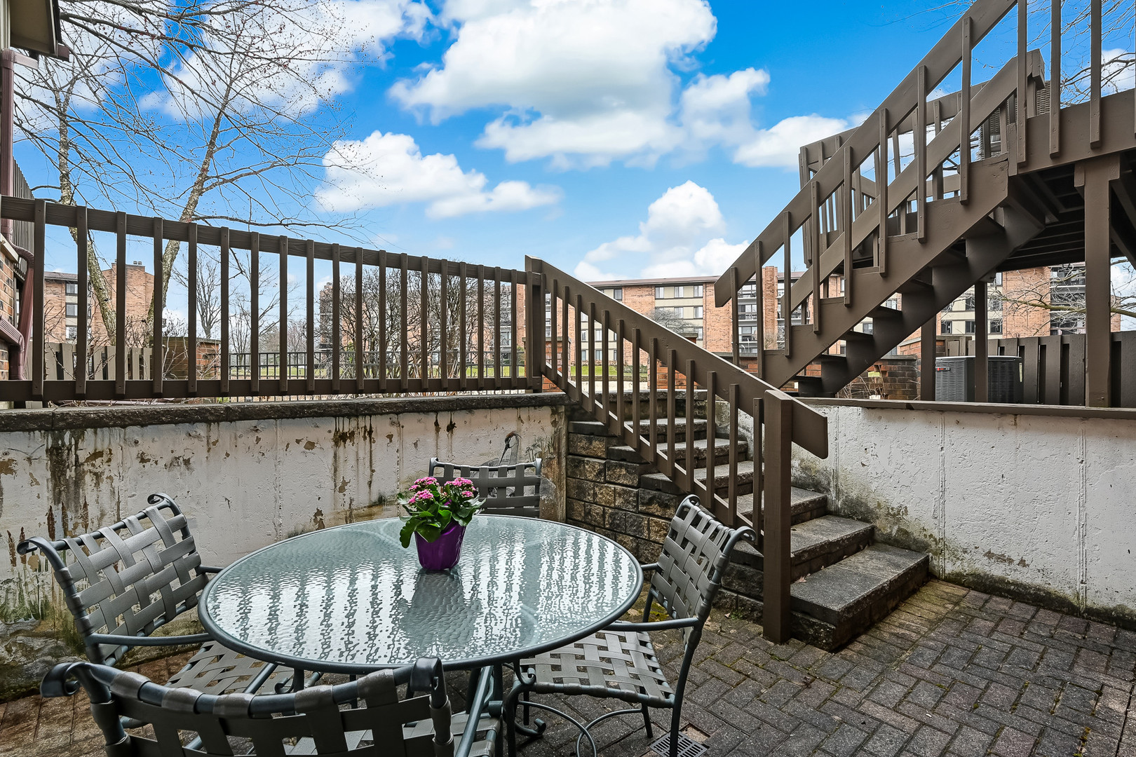 27 Windward Circle Willowbrook, IL 60527 - Photo 24 of 35 a view of a chairs and table in the balcony