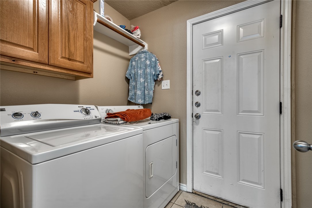 2327 Autumn Chase Loop College Station, TX 77840 - Photo 4 of 12 a utility room with dryer and washer