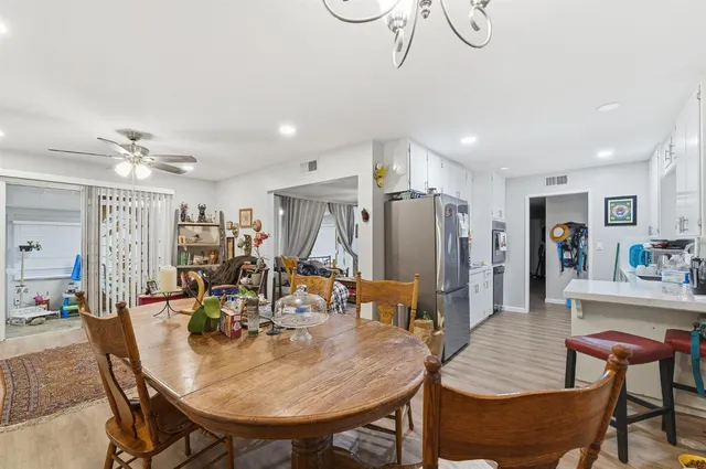 a view of a dining room with furniture