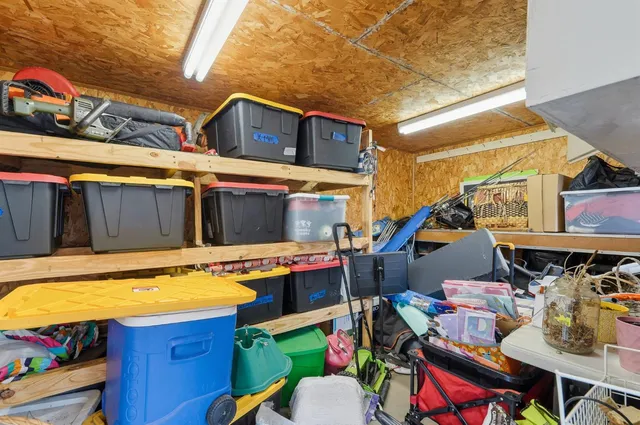 a view of a porch with potted plants