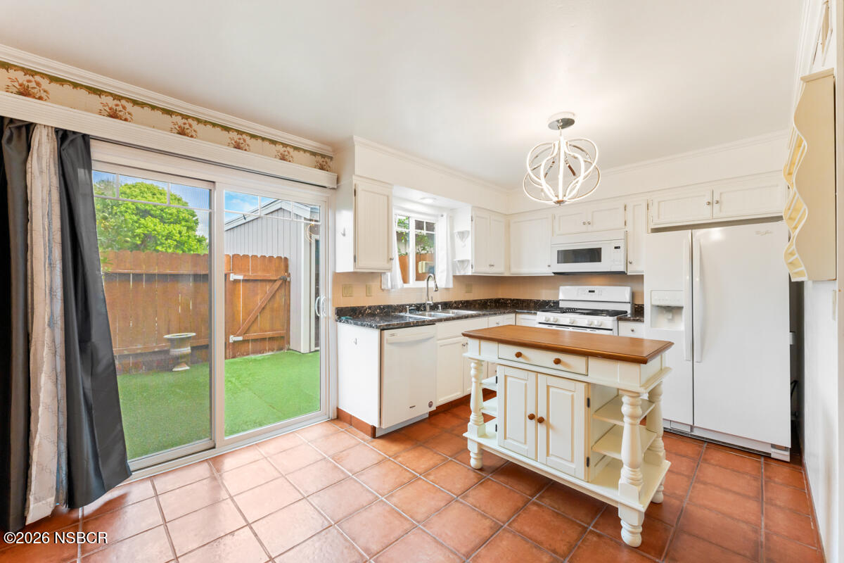 222 North R Street Lompoc, CA 93436 - Photo 12 of 35 Kitchen w/ Patio Access