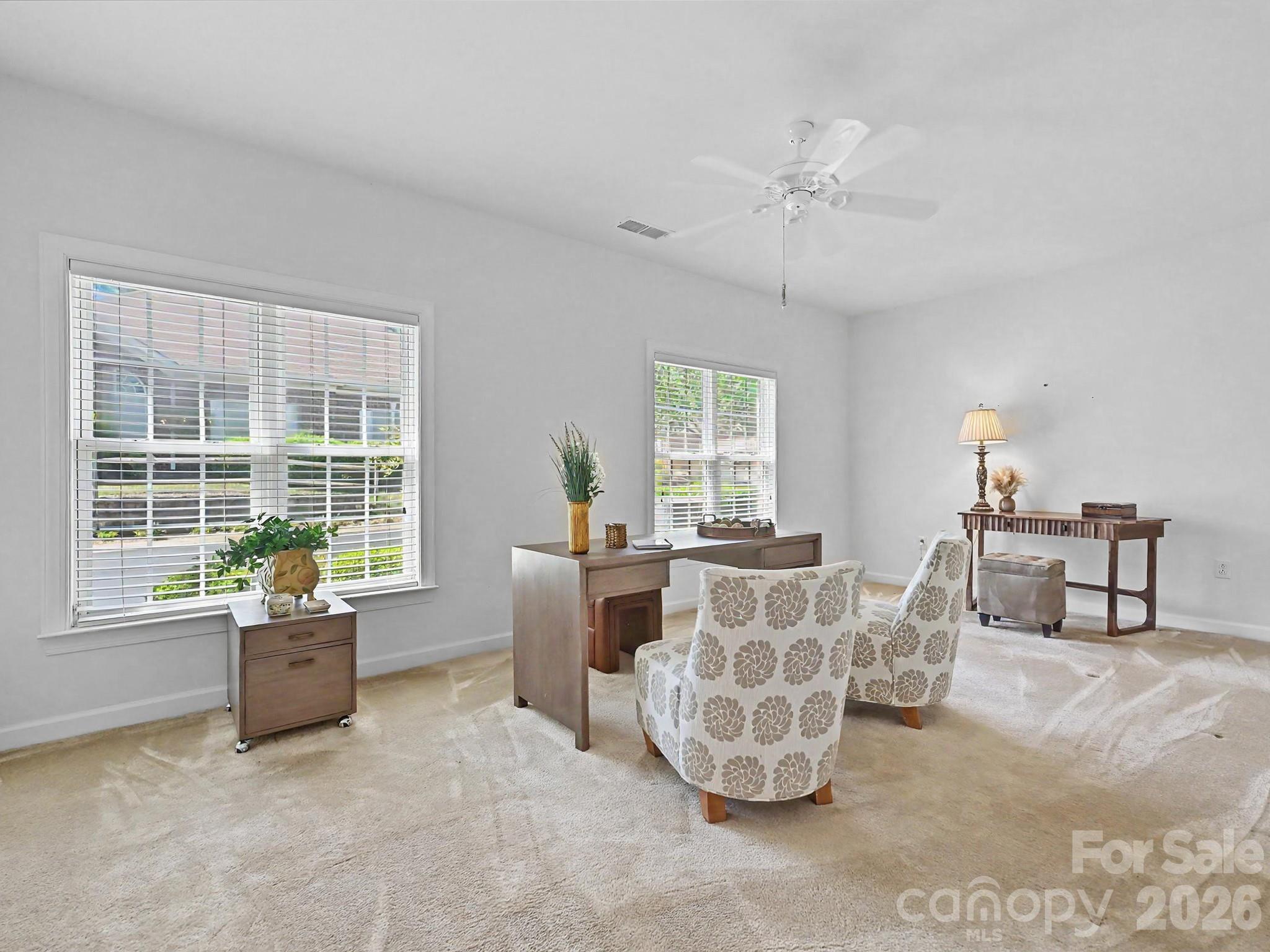 8655 Windsor Ridge Drive Charlotte, NC 28277 - Photo 17 of 22 a living room with furniture and a large window