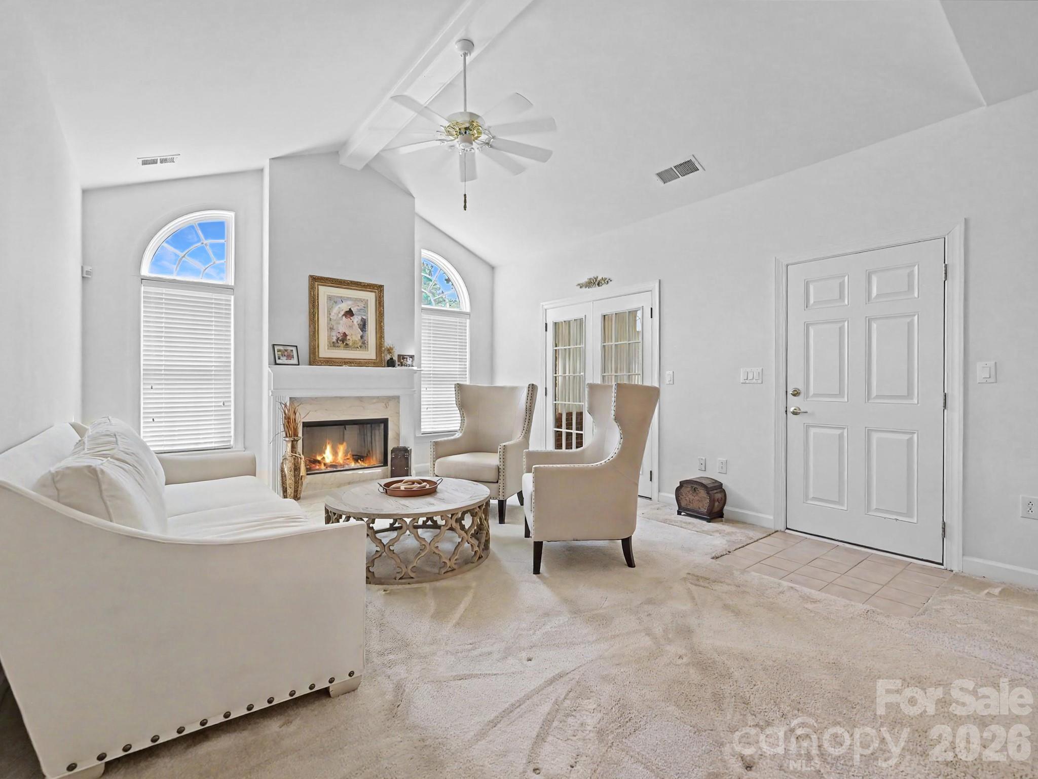 8655 Windsor Ridge Drive Charlotte, NC 28277 - Photo 4 of 22 a living room with furniture and a fireplace
