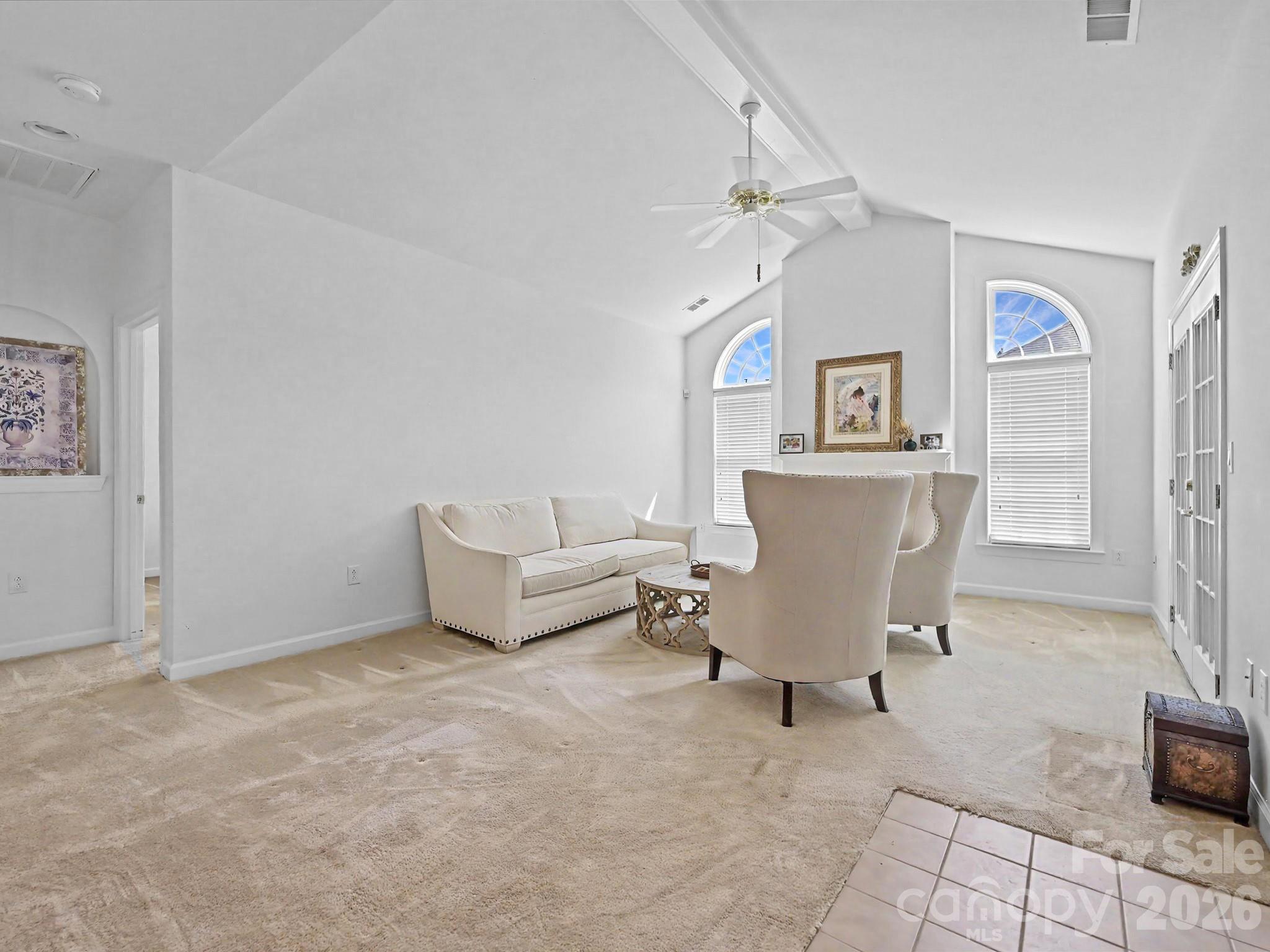 8655 Windsor Ridge Drive Charlotte, NC 28277 - Photo 7 of 22 a living room with furniture and a table
