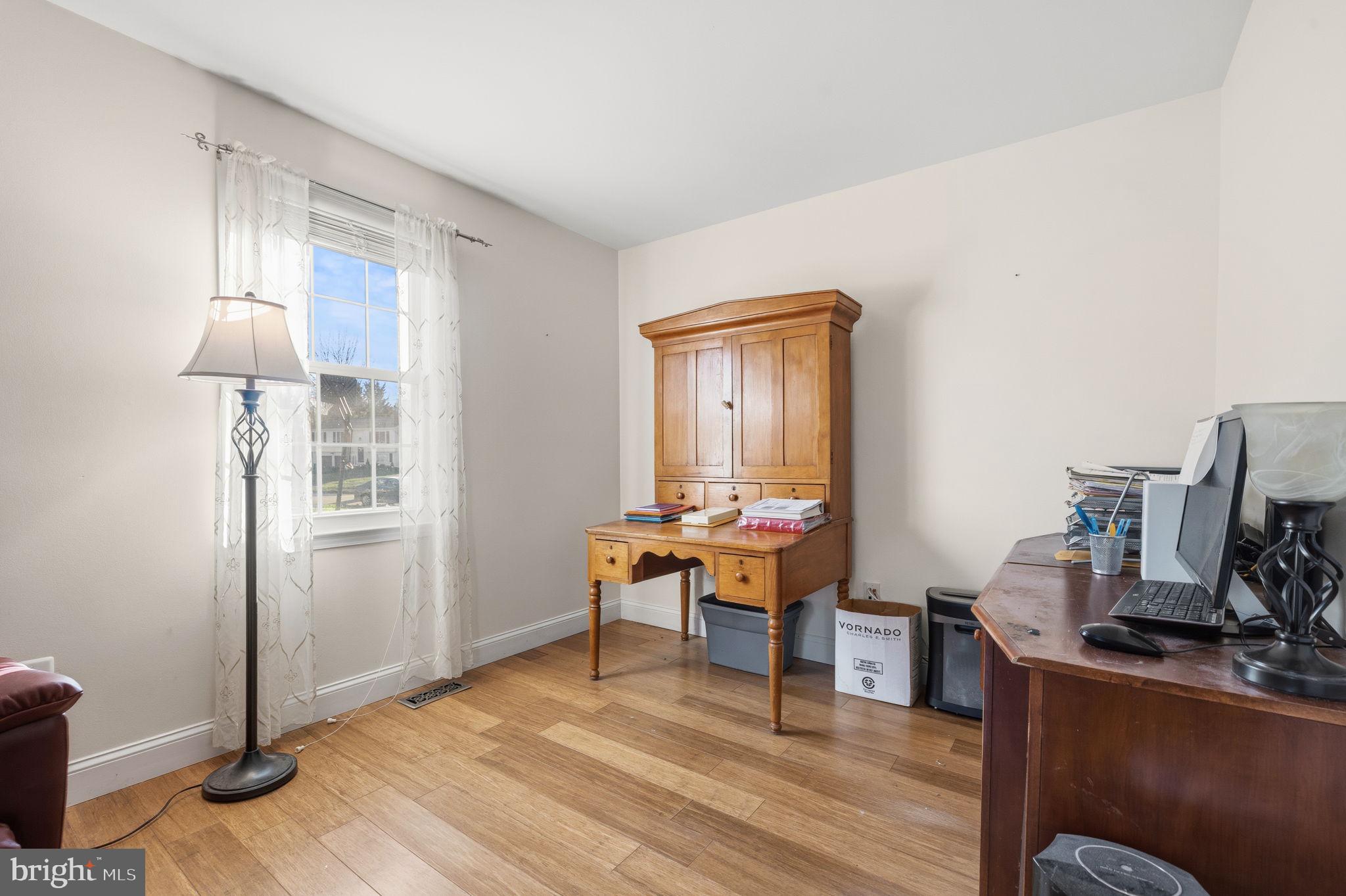 4357 Cub Run Road Chantilly, VA 20151 - Photo 14 of 40 a work room with furniture and wooden floor