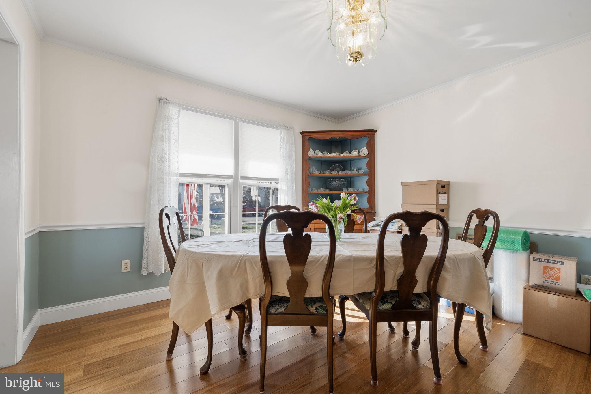 4357 Cub Run Road Chantilly, VA 20151 - Photo 15 of 40 a view of a dining room with furniture window and wooden floor
