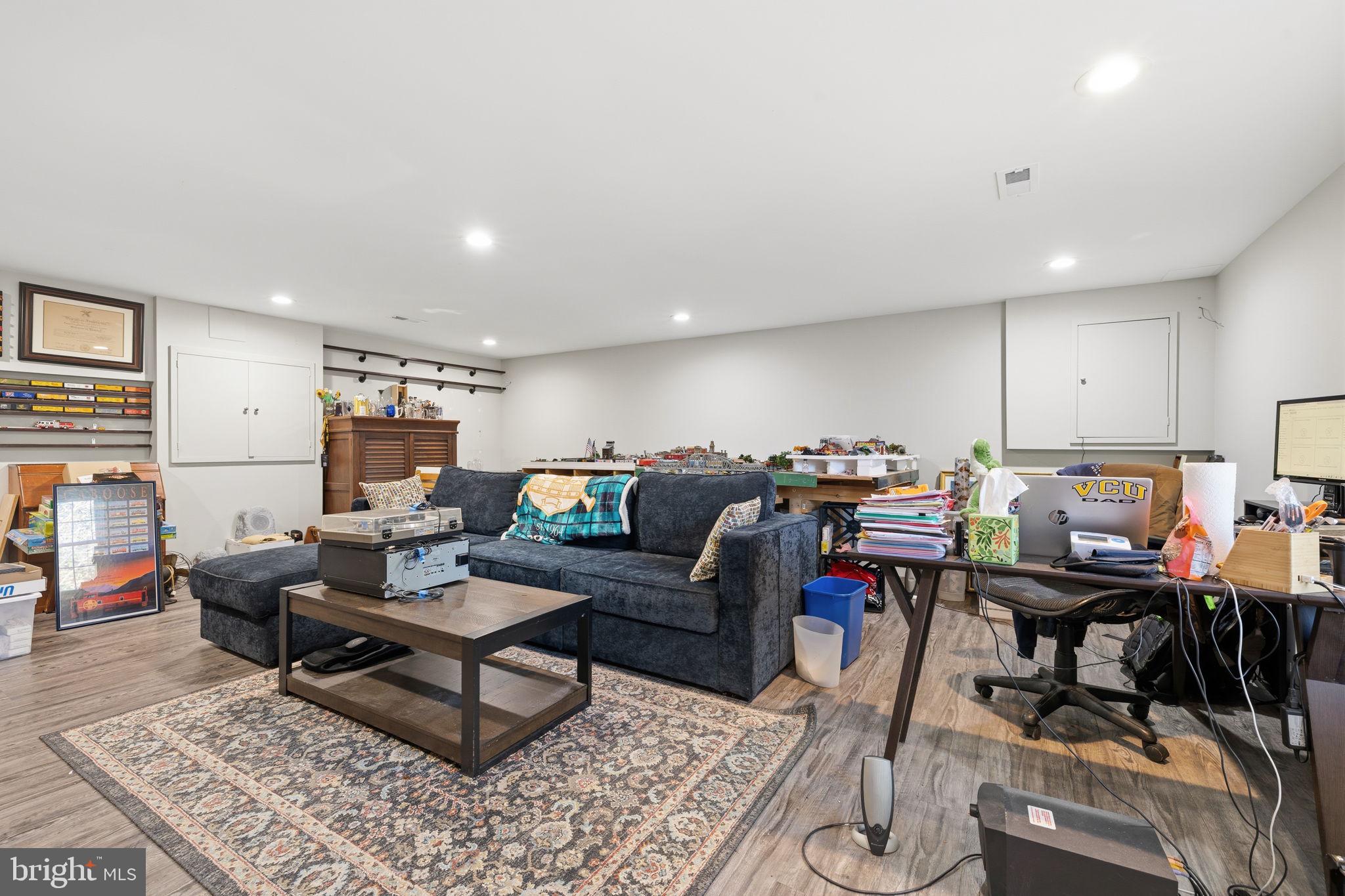 4357 Cub Run Road Chantilly, VA 20151 - Photo 28 of 40 a living room with furniture and a rug