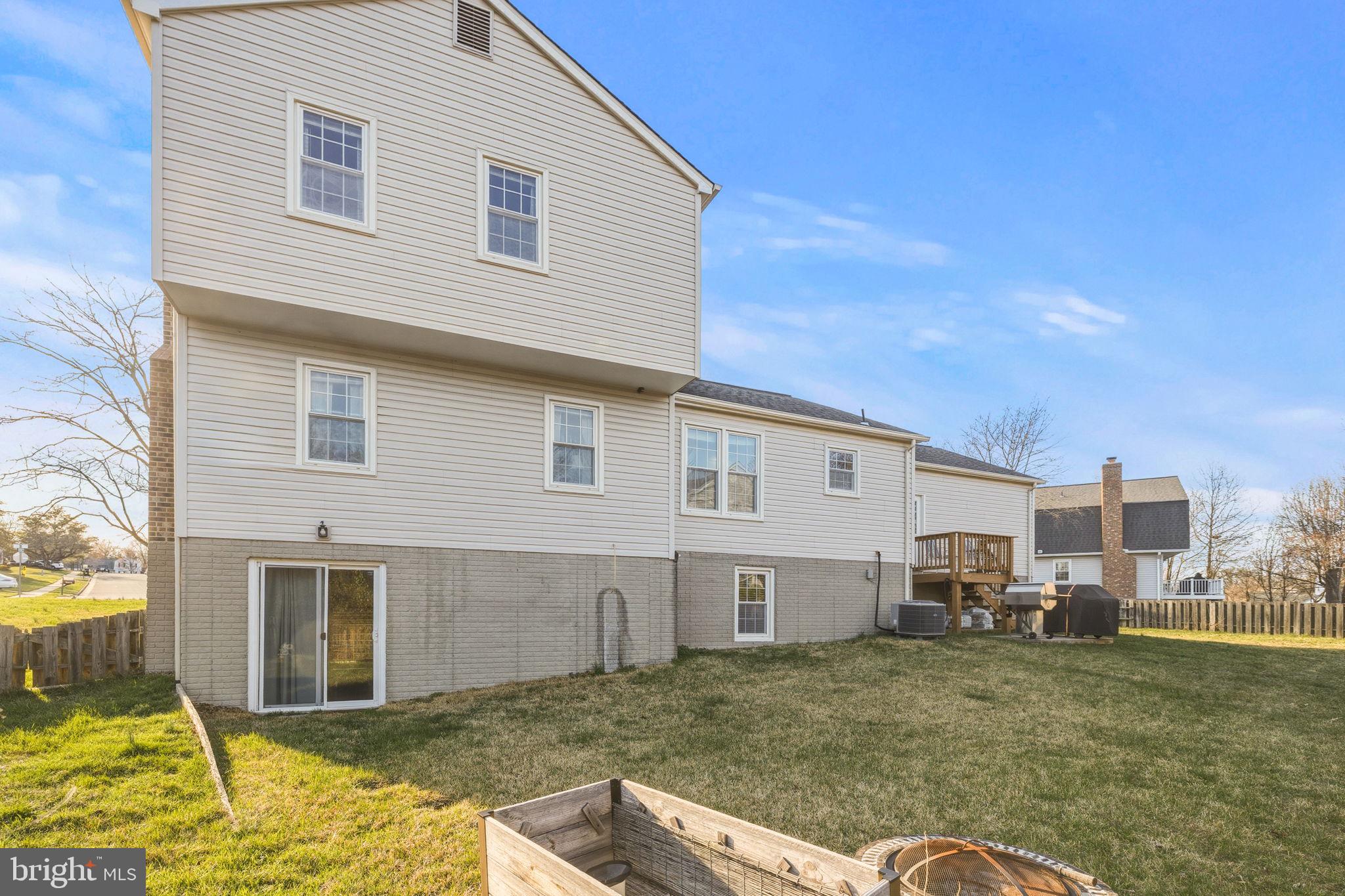 4357 Cub Run Road Chantilly, VA 20151 - Photo 29 of 40 a view of a house with backyard and sitting area