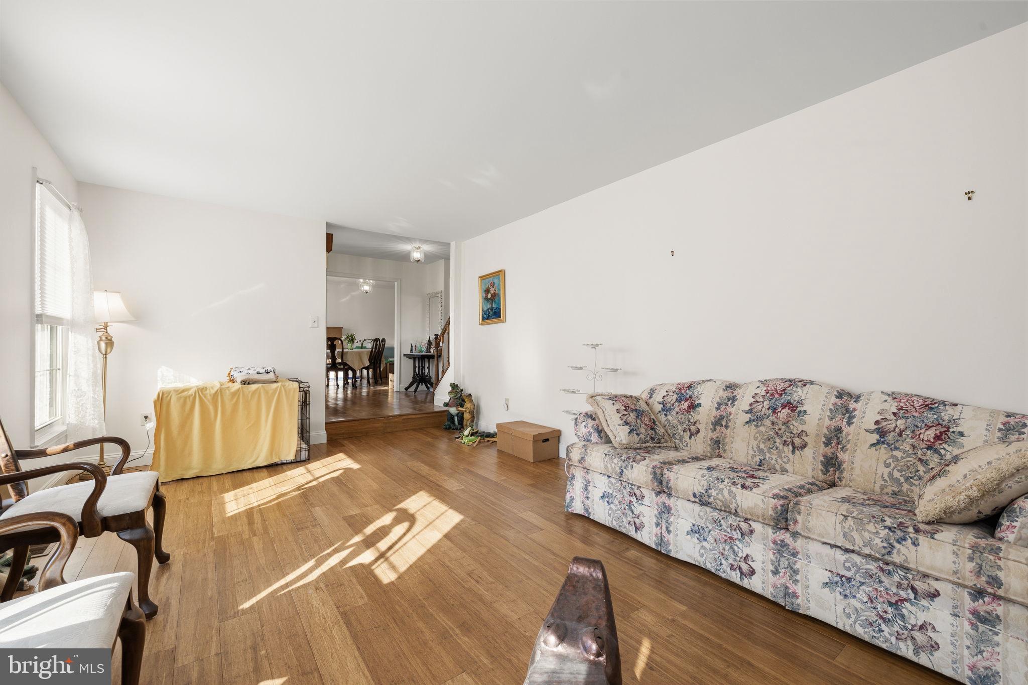 4357 Cub Run Road Chantilly, VA 20151 - Photo 7 of 40 a living room with furniture and a couch