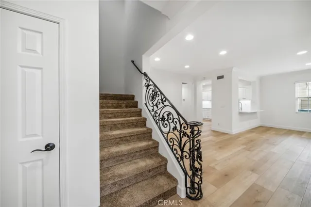 a view of entryway with stairs