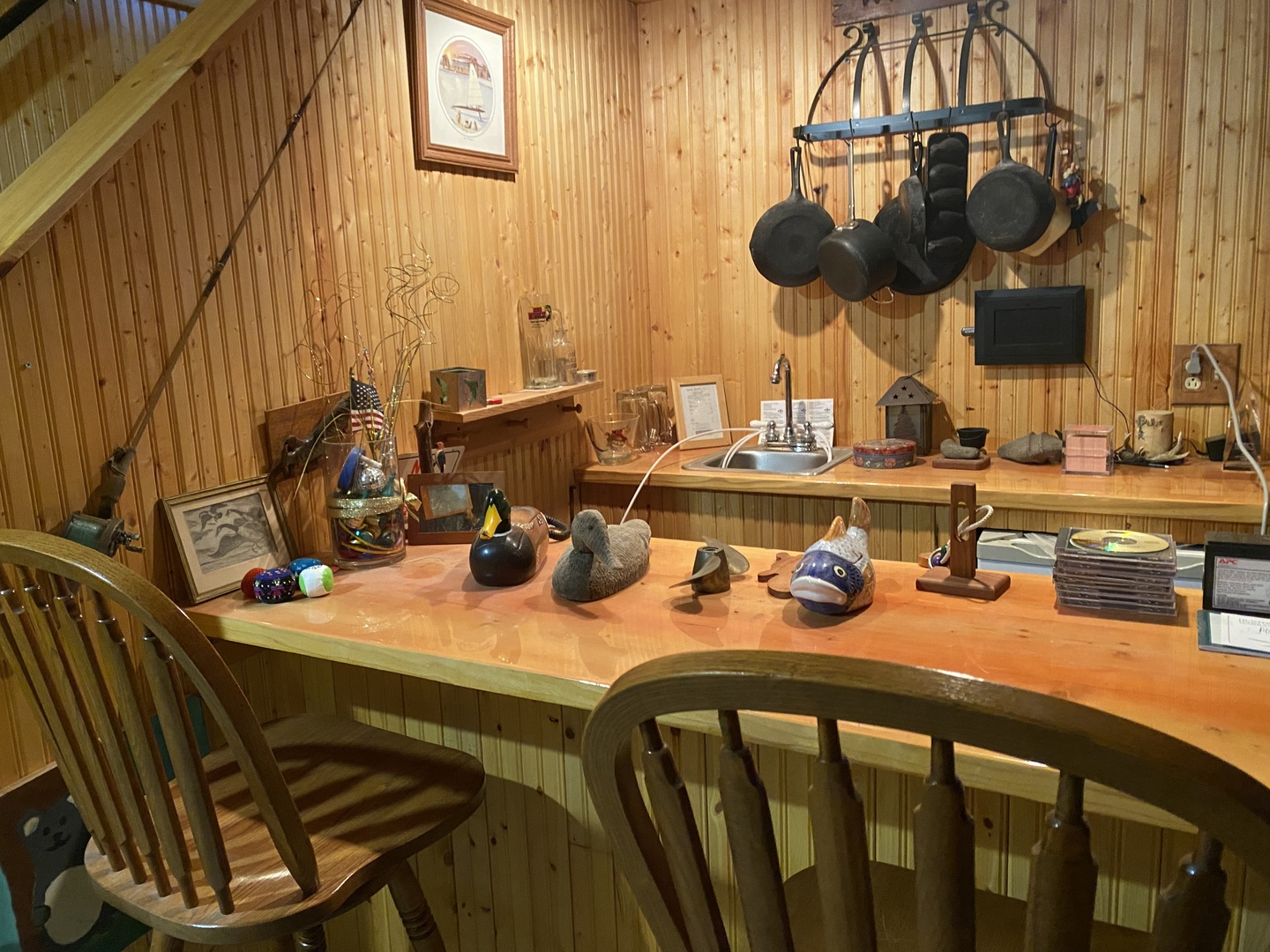 621 Young Avenue Batavia, IL 60510 - Photo 24 of 32 a kitchen with a stove a sink and a dining table with wooden floor