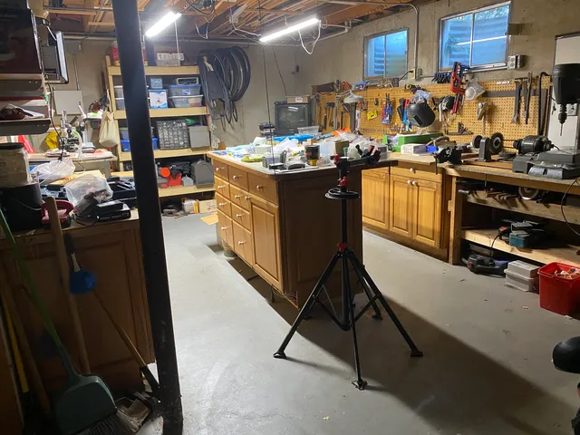 a bathroom with a sink a mirror and a toilet