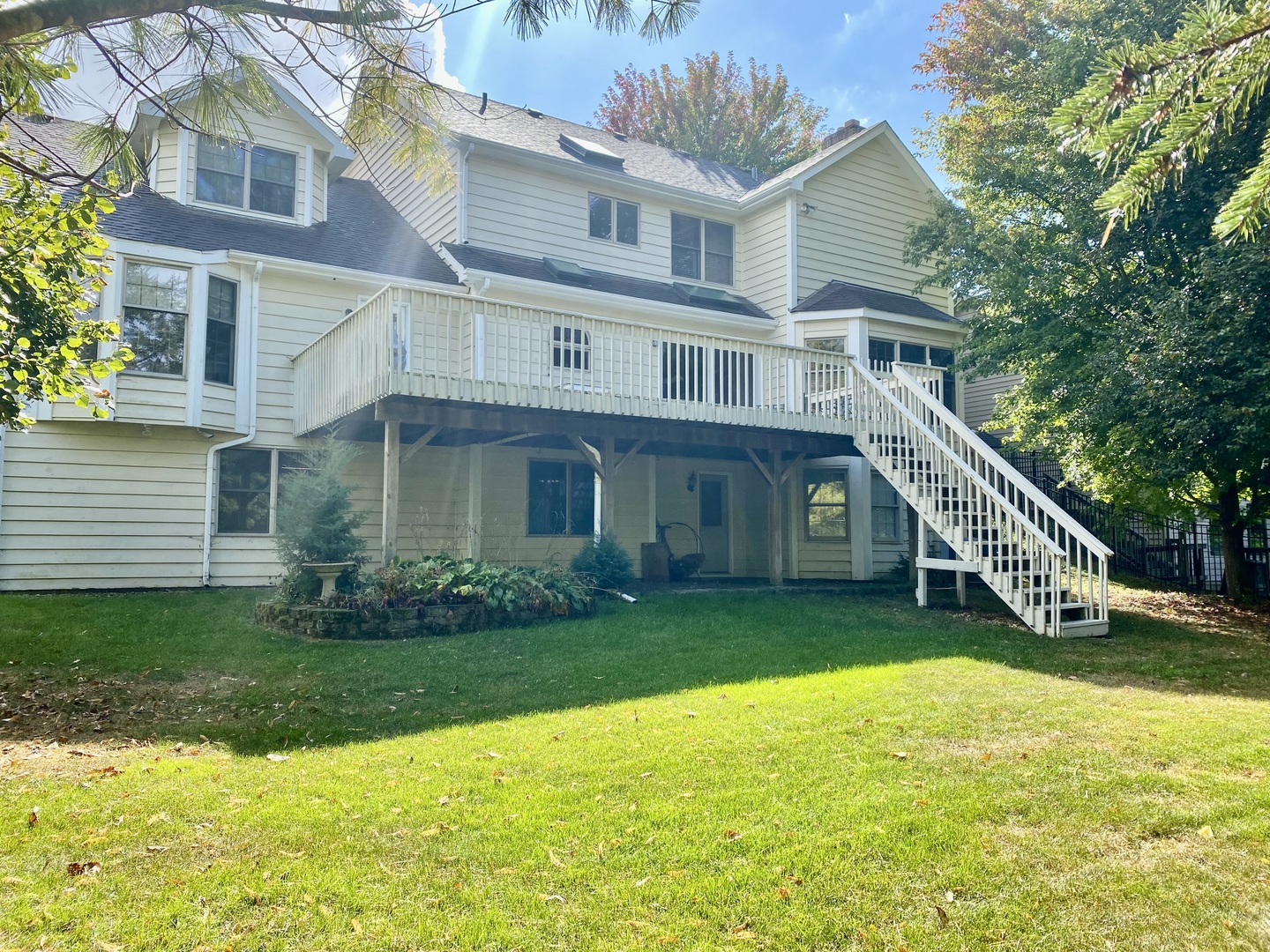 621 Young Avenue Batavia, IL 60510 - Photo 31 of 32 a view of a house with a garden and deck