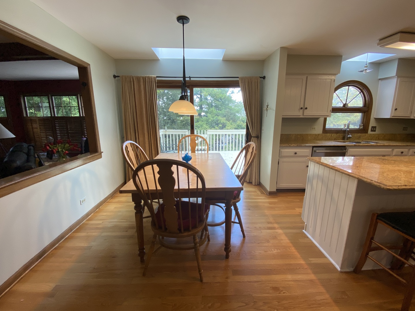 621 Young Avenue Batavia, IL 60510 - Photo 9 of 32 a dining room with furniture a chandelier and wooden floor