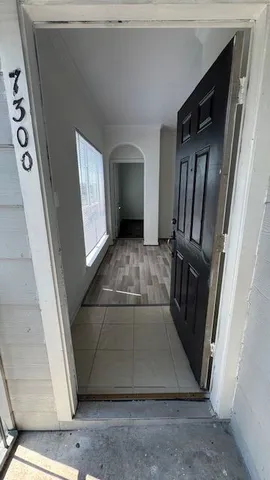 a view of a hallway view with staircase