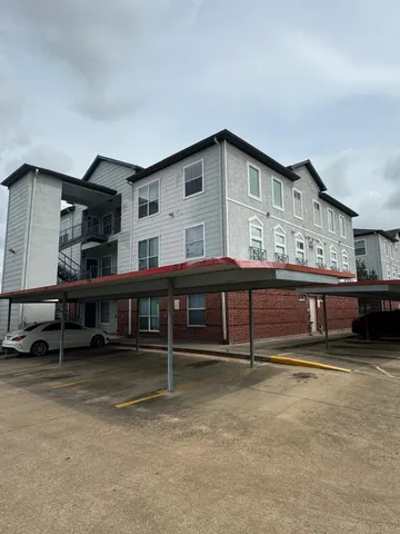 a view of a house with pool and porch