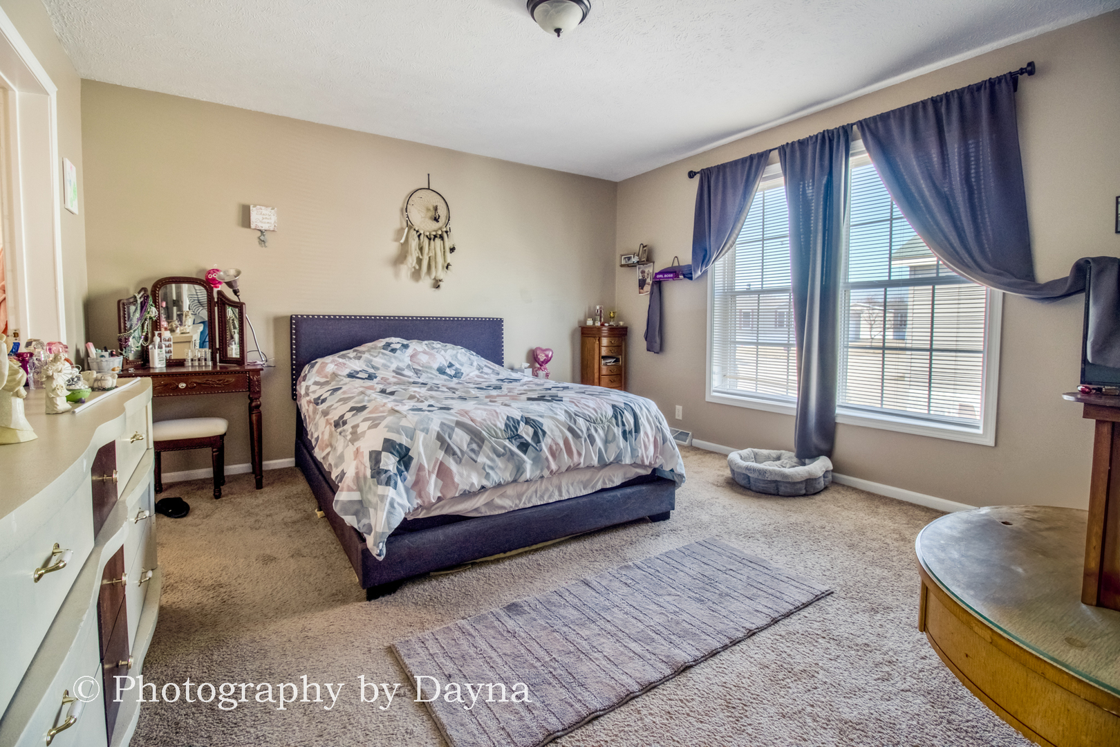 61 St Pauls Drive Bourbonnais, IL 60914 - Photo 11 of 17 a bedroom with a bed dresser and a window