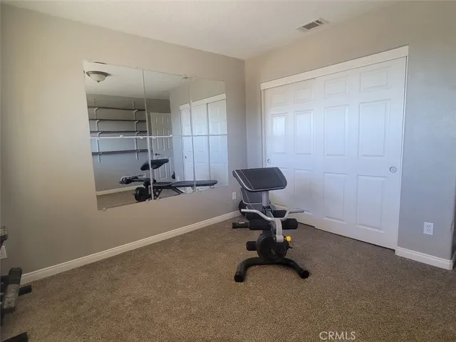 a room with furniture and a glass door