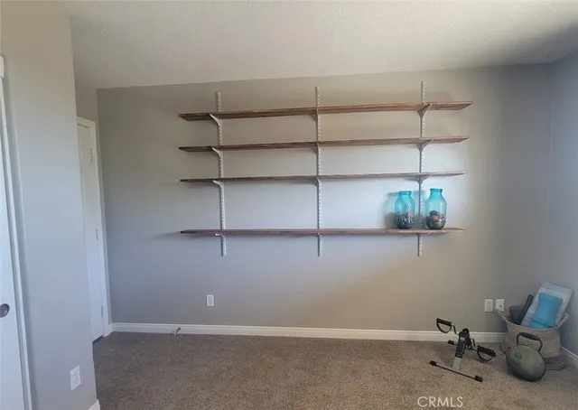 a lobby with furniture and potted plant