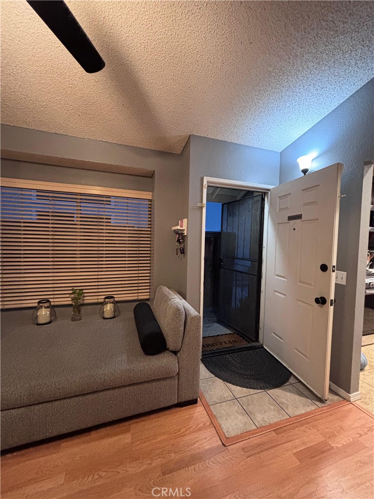 560 Coudures Way Perris, CA 92571 - Photo 21 of 35 a bathroom with a tub and shower
